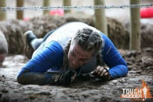 Charter Tax take part in Tough Mudder 2016: Crawling through mud